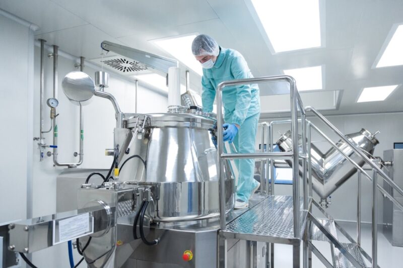 Pharmaceutical factory man worker in protective cl 2026 01 08 05 17 03 utc