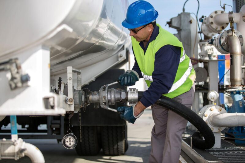 Engineer transfering fuel