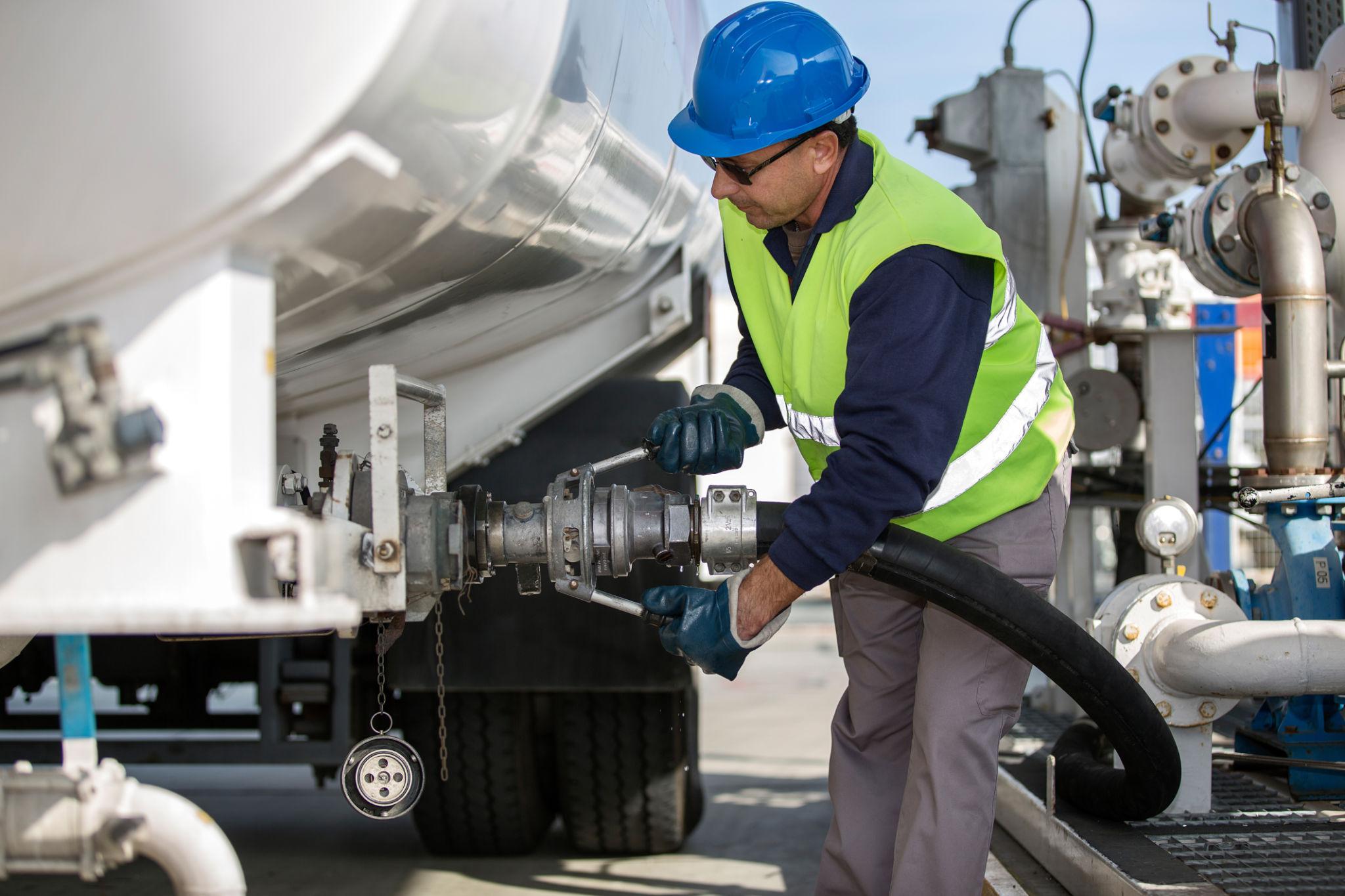 Engineer transfering fuel